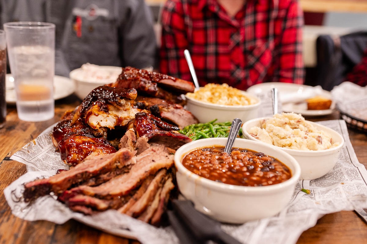 Barbecue meats and side dishes on the table